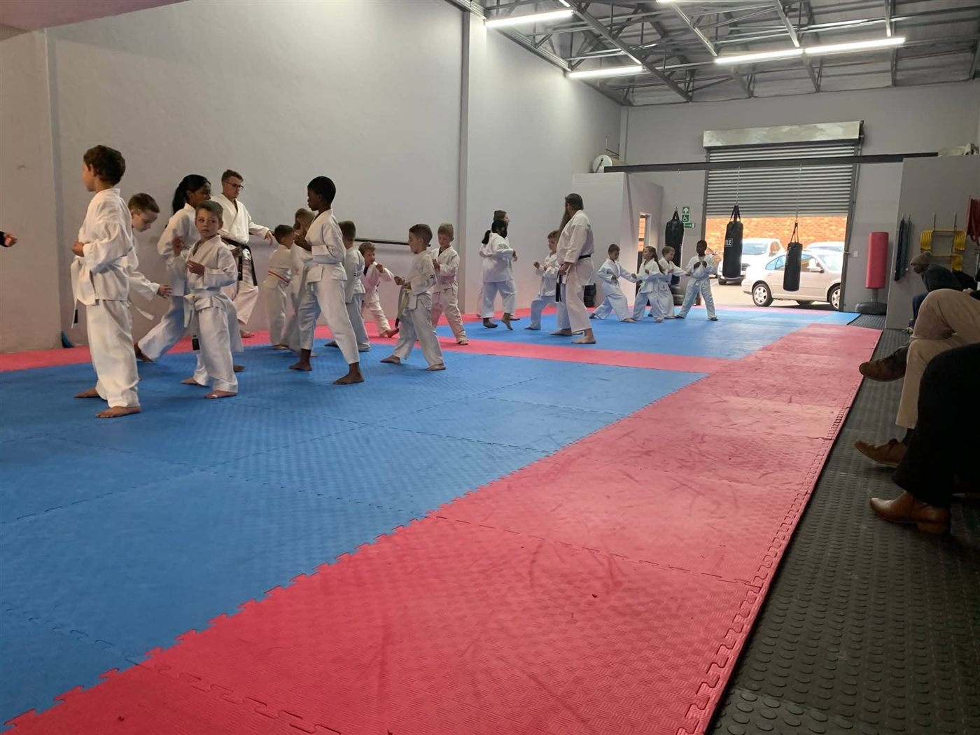 Children training on the mats at the KarateZone dojo in Hennopspark